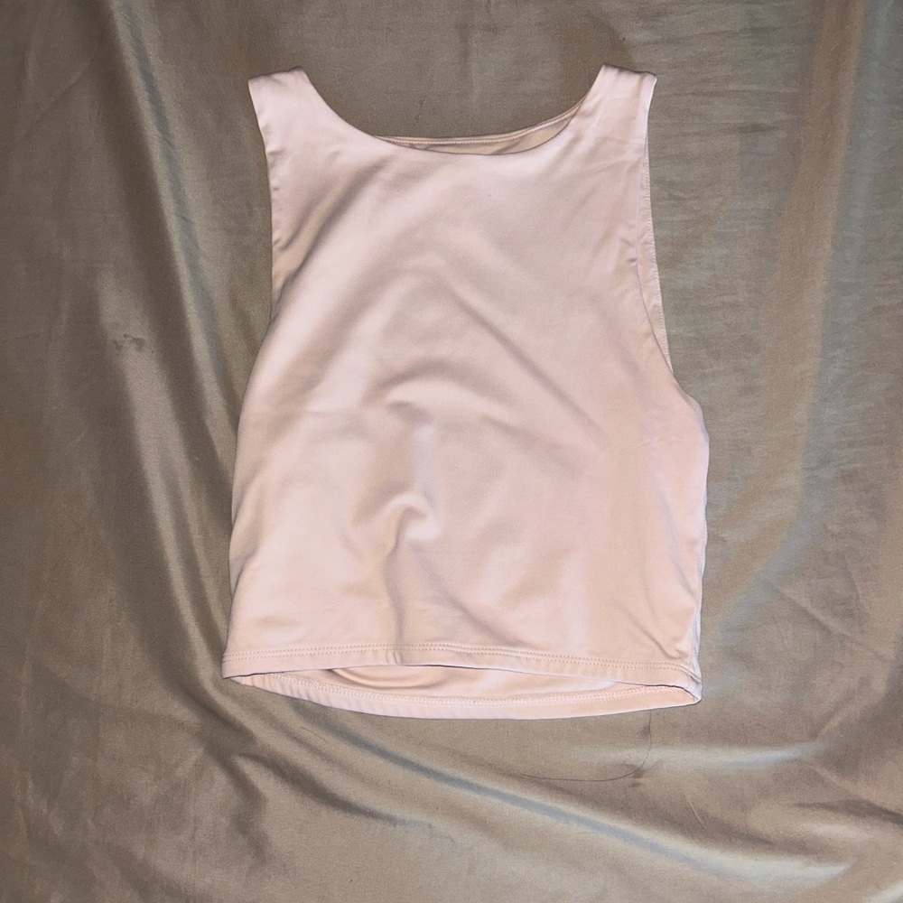 Selling a baby pink tank top!